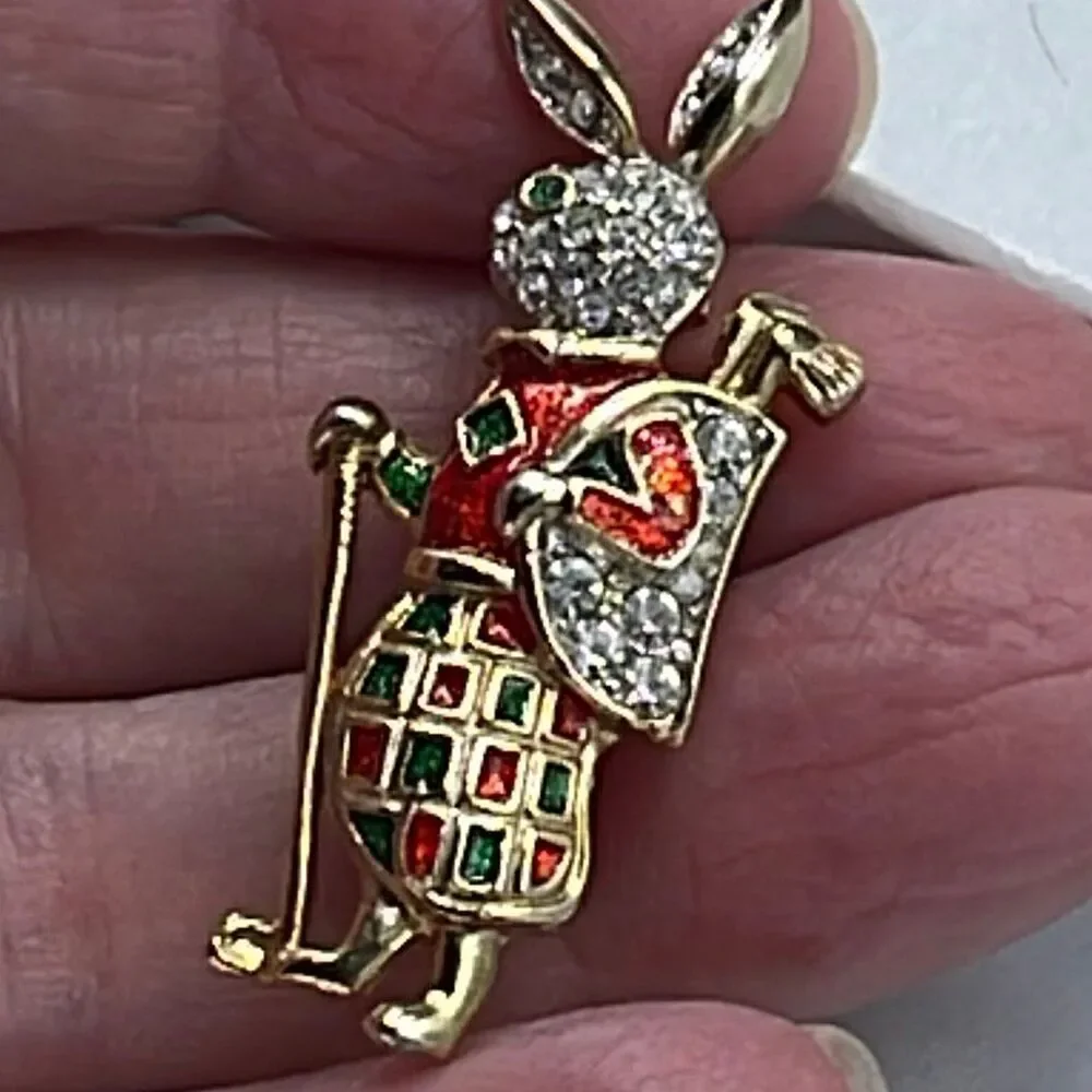 Vintage rhinestone enamel bunny tartan plaid golfer brooch.